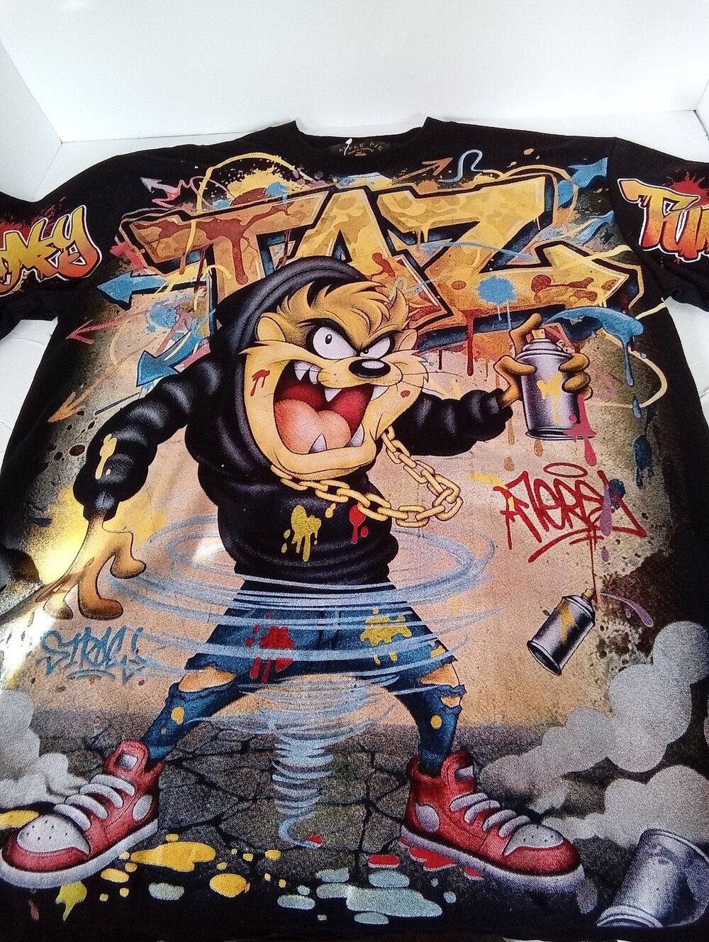 Apple Black Taz AOP Graphic Tee with Gold Logo and Multicolor Front Print - Picture 6 of 10